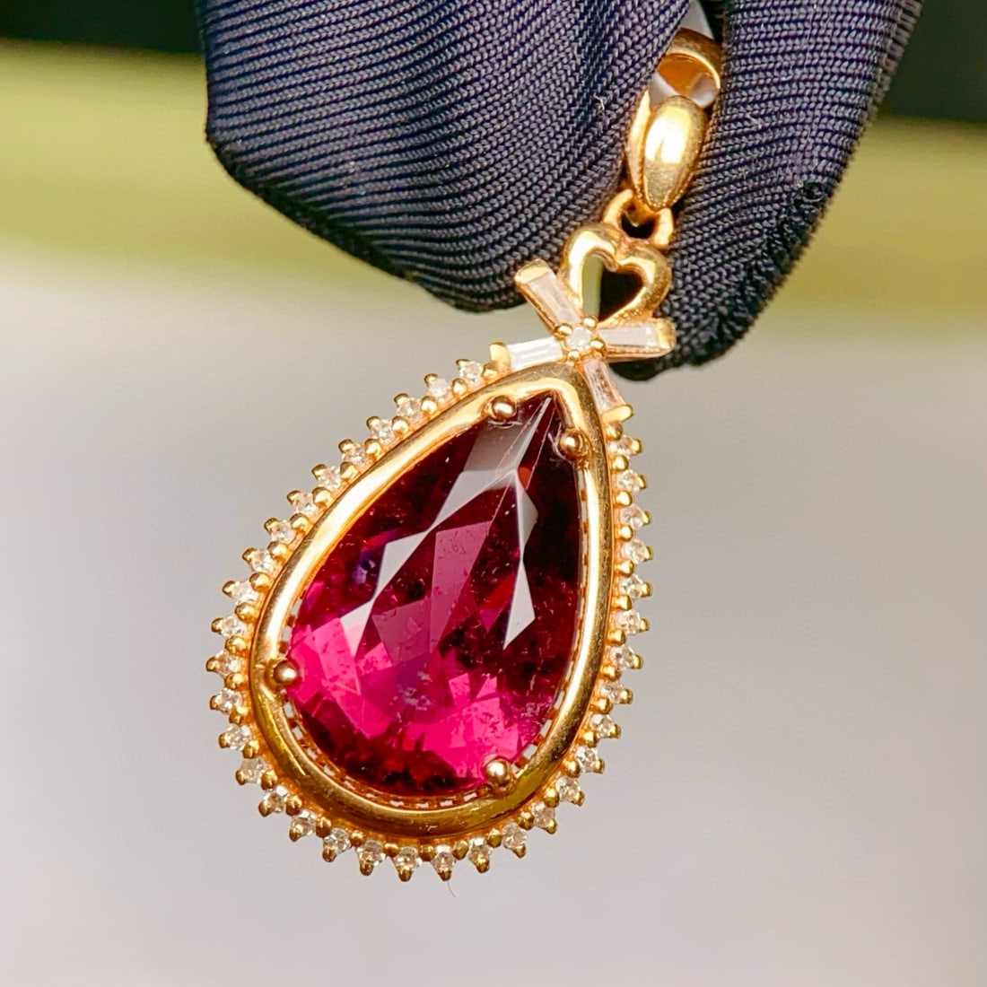 14k Gold 3.87 Ctw Natural Tourmaline & Diamond Pendant( Without Chain ): Ref:231079121 // gold content:14k gold // main gemstone:tourmaline // shape:pear // carat weight:3. 65ct // color:red // treatment:natural // // adjacent gemstone 2 : diamond // number of stones:47