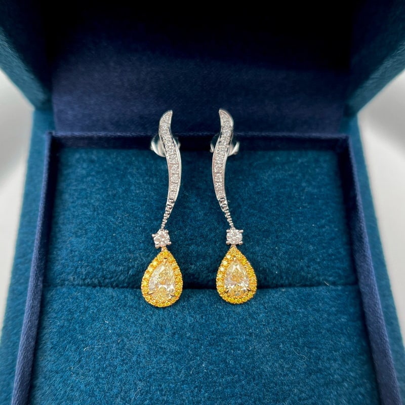 14k Gold 0.96 Ctw Natural Yellow Diamond & Diamond Earrings: Ref:231080030 // gold content:14k gold // main gemstone:yellow diamond // shape:pear // carat weight:0. 61ct // color:yellow // treatment:natural // // adjacent gemstone 2 : diamond // shape:round
