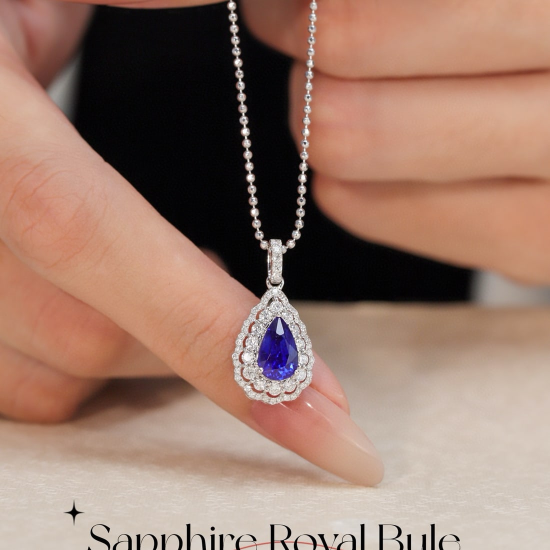 14k Gold 2.23 Ctw Natural Sapphire & Diamond Pendant( Without Chain ): Ref:231080156 // gold content:14k gold // main gemstone:sapphire // shape:pear // carat weight:1. 77ct // color:royal blue // treatment:natural // // adjacent gemstone 2 : diamond // shape:round //