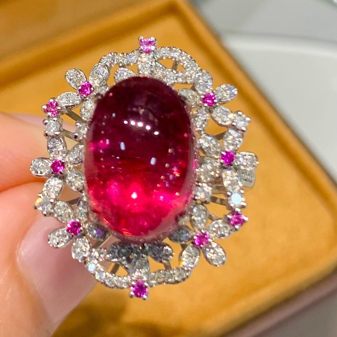 14k Gold 7.3 Ct Natural Tourmaline & Diamond Ring: Ref:231080175 // gold content:14k gold // ring size:7. 25us // // main gemstone:tourmaline // shape:oval // carat weight:7. 3ct // color:red // treatment:natural // // adjacent gemstone 2 : diamond //