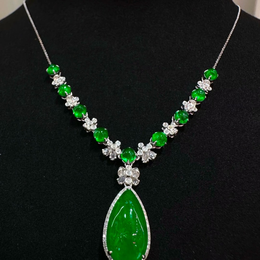 14k Gold 6.38 Ct Vivid Green Natural Emerald & Diamond & Sapphire Necklace: Ref:231080340 // gold content:14k gold // main gemstone:emerald // shape:pear // carat weight:6. 38ct // color:vivid green // treatment:natural // // adjacent gemstone 2 : diamond // shape:round //