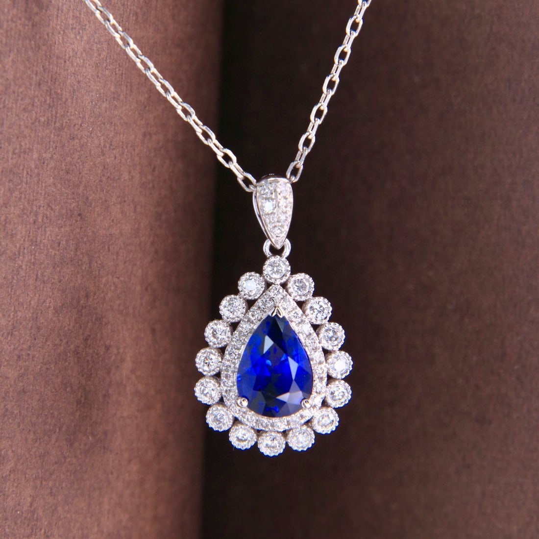 14k Gold 1.44 Ctw Natural Sapphire & Diamond Pendant( Without Chain ): Ref:231080350 // gold content:14k gold // main gemstone:sapphire // shape:pear // carat weight:1. 19ct // color:royal blue // treatment:natural // // adjacent gemstone 2 : diamond // shape:round //