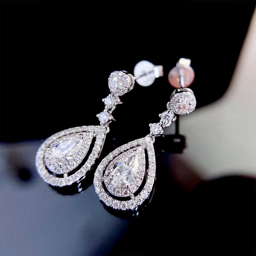 Gia Certified 14k Gold 0.30 Ct Natural E Si1 Pear Diamond Earrings: Ref:231080352 // gold content:14k gold // main gemstone:diamond // certified:gia // shape:pear // carat weight:0. 30ct // clarity grade:si1 // color:e // treatment:natural // // adjacent gemstone 2