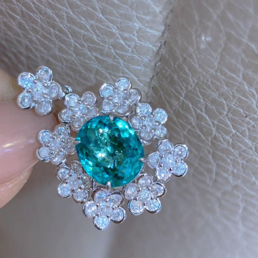 14k Gold 4.1 Ctw Natural Paraiba Tourmaline & Diamond Pendant( Without Chain ): Ref:231080396 // gold content:14k gold // main gemstone:paraiba tourmaline // shape:oval // carat weight:2. 8ct // color:blue // treatment:natural // // adjacent gemstone 2 : diamond // shape:round //