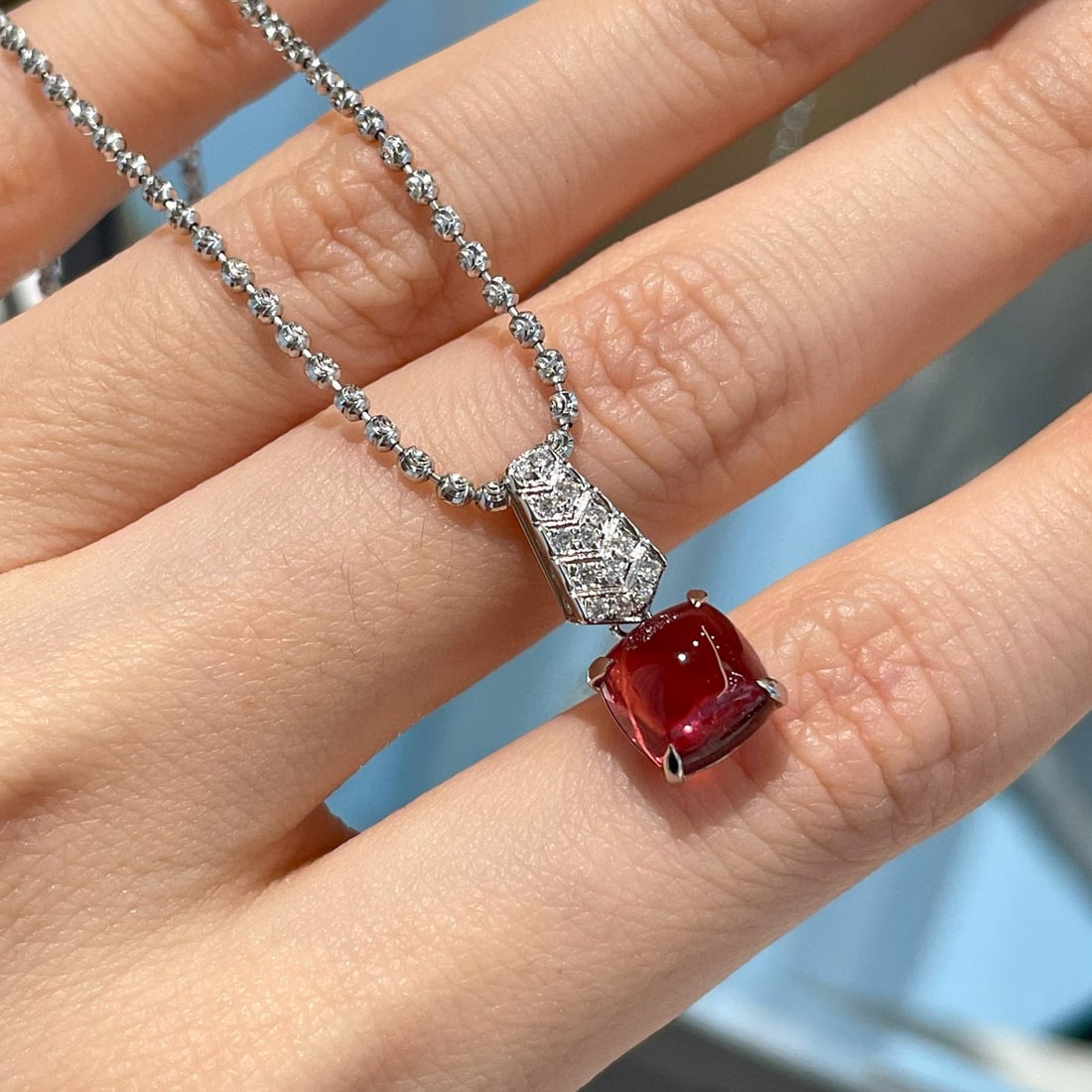14k Gold 2.3 Ct Natural Tourmaline & Diamond Pendant( Without Chain ): Ref:231080424 // gold content:14k gold // main gemstone:tourmaline // shape:sugar-loaf // carat weight:2. 3ct // color:red // treatment:natural // // adjacent gemstone 2 : diamond // shape:round //