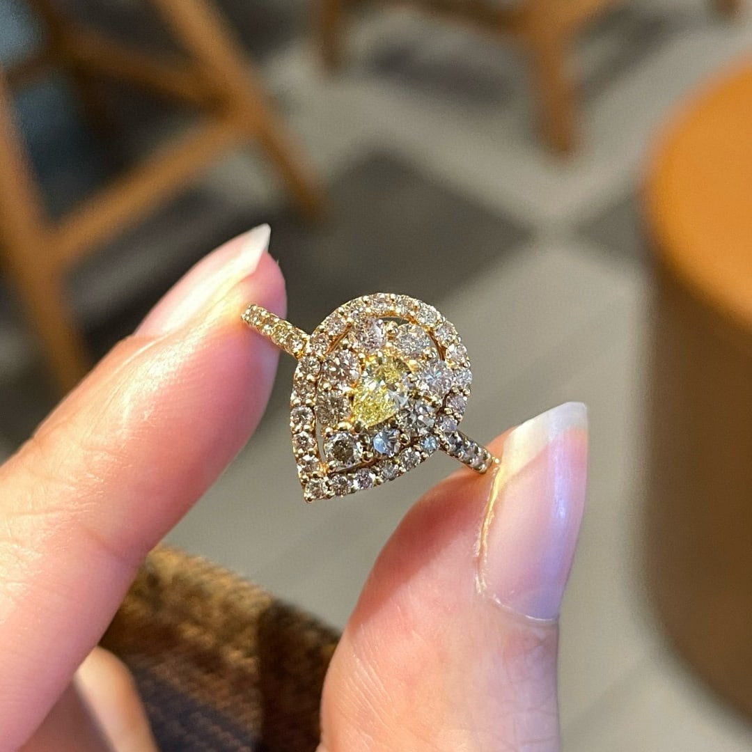 14k Gold 1.00 Ctw Natural Yellow Diamond & Diamond Ring: Ref:231080448 // gold content:14k gold // ring size:7. 25us // // main gemstone:yellow diamond // shape:pear // carat weight:0. 15ct // color:yellow // treatment:natural // // adjacent gemstone 2