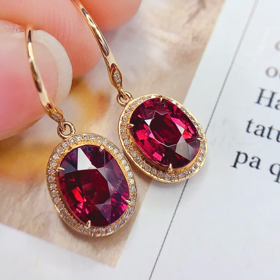 14k Gold 5 Ct Natural Tourmaline & Diamond Earrings: Ref:231081219 // gold content:14k gold // main gemstone:tourmaline // shape:oval // carat weight:5ct // color:red // treatment:natural // // adjacent gemstone 2 : diamond // number of stones:82 //