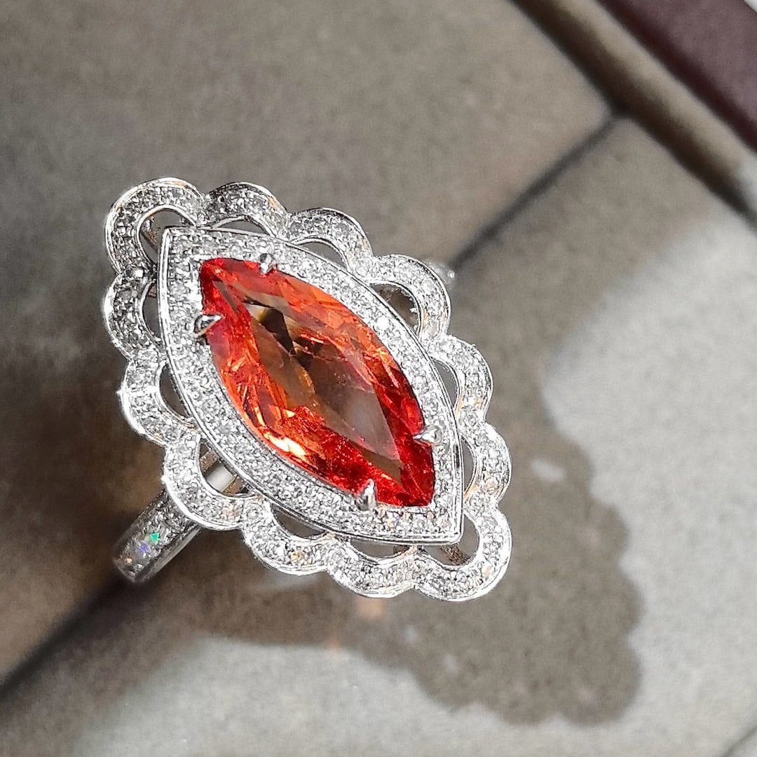 14k Gold 2.21 Ctw Natural Spinel & Diamond Ring: Ref:231082093 // gold content:14k gold // ring size:7. 25us // // main gemstone:spinel // shape:marquise // carat weight:1. 76ct // color:orange // treatment:natural // // adjacent gemstone 2 : diamon