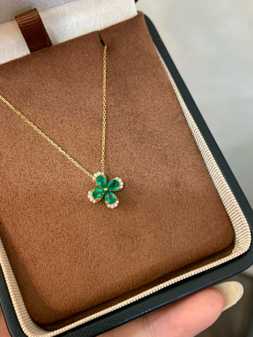 14k Gold 0.72 Ctw Vivid Green Natural Emerald & Diamond Necklace: Ref:231082197 // gold content:14k gold // main gemstone:emerald // shape:pear // carat weight:0. 66ct // color:vivid green // treatment:natural // // adjacent gemstone 2 : diamond // shape:round //