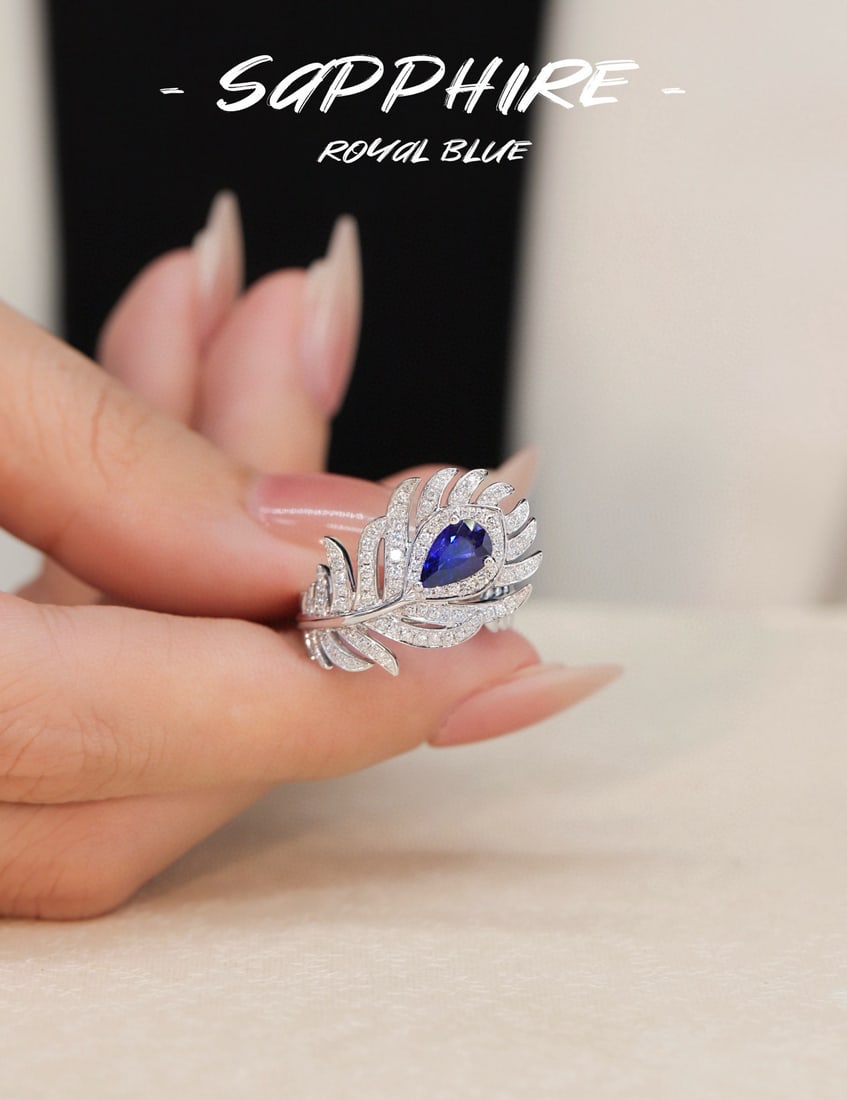 14k Gold 1.45 Ctw Natural Sapphire & Diamond Ring: Ref:231082204 // gold content:14k gold // ring size:7. 25us // // main gemstone:sapphire // shape:pear // carat weight:1. 06ct // color:royal blue // treatment:natural // // adjacent gemstone 2 :