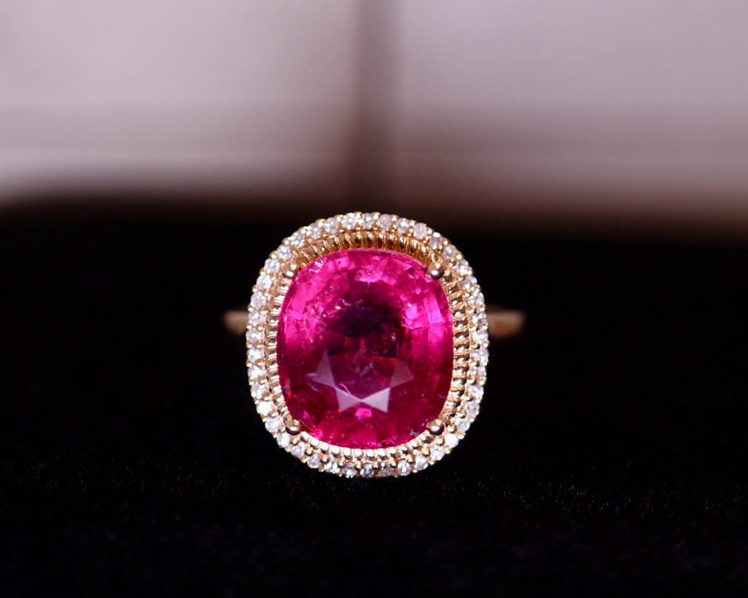 14k Gold 5.1 Ct Natural Tourmaline & Diamond Ring: Ref:231082377 // gold content:14k gold // ring size:7. 25us // // main gemstone:tourmaline // shape:cushion // carat weight:5. 1ct // color:red // treatment:natural // // adjacent gemstone 2 : diamond