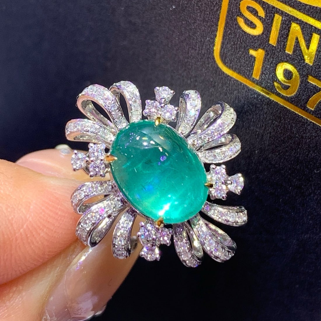 14K GOLD 4.96 CTW NATURAL TOURMALINE & DIAMOND RING: Ref:231083082 // Gold Content:14K Gold // Ring Size:7.25 US // // Main Gemstone:Tourmaline // Shape:Oval // Carat Weight:4.5ct // Color:Lagoon Color // Treatment:Natural // // Adjacent Gemstone 2