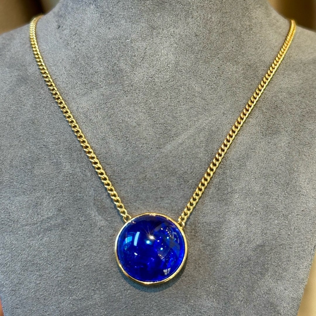 14K GOLD 14.63 CT NATURAL TANZANITE NECKLACE: Ref:231083204 // Gold Content:14K Gold // Main Gemstone:Tanzanite // Shape:Round // Carat Weight:14.63ct // Color:Blue // Treatment:Natural // Cut Grade:G // Condition: NewLow Estimate: 4800.00High