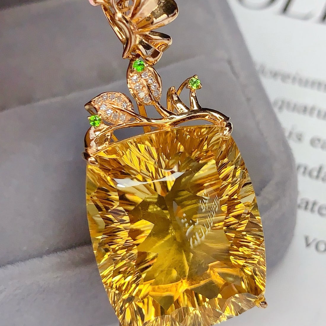 14K GOLD 39.10 CT NATURAL CITRINE & DIAMOND PENDANT( WITHOUT CHAIN ): Ref:231083212 // Gold Content:14K Gold // Main Gemstone:Citrine // Shape:Cushion // Carat Weight:39.10ct // Color:Yellow // Treatment:Natural // // Adjacent Gemstone 2 : Diamond // Shape:Round //