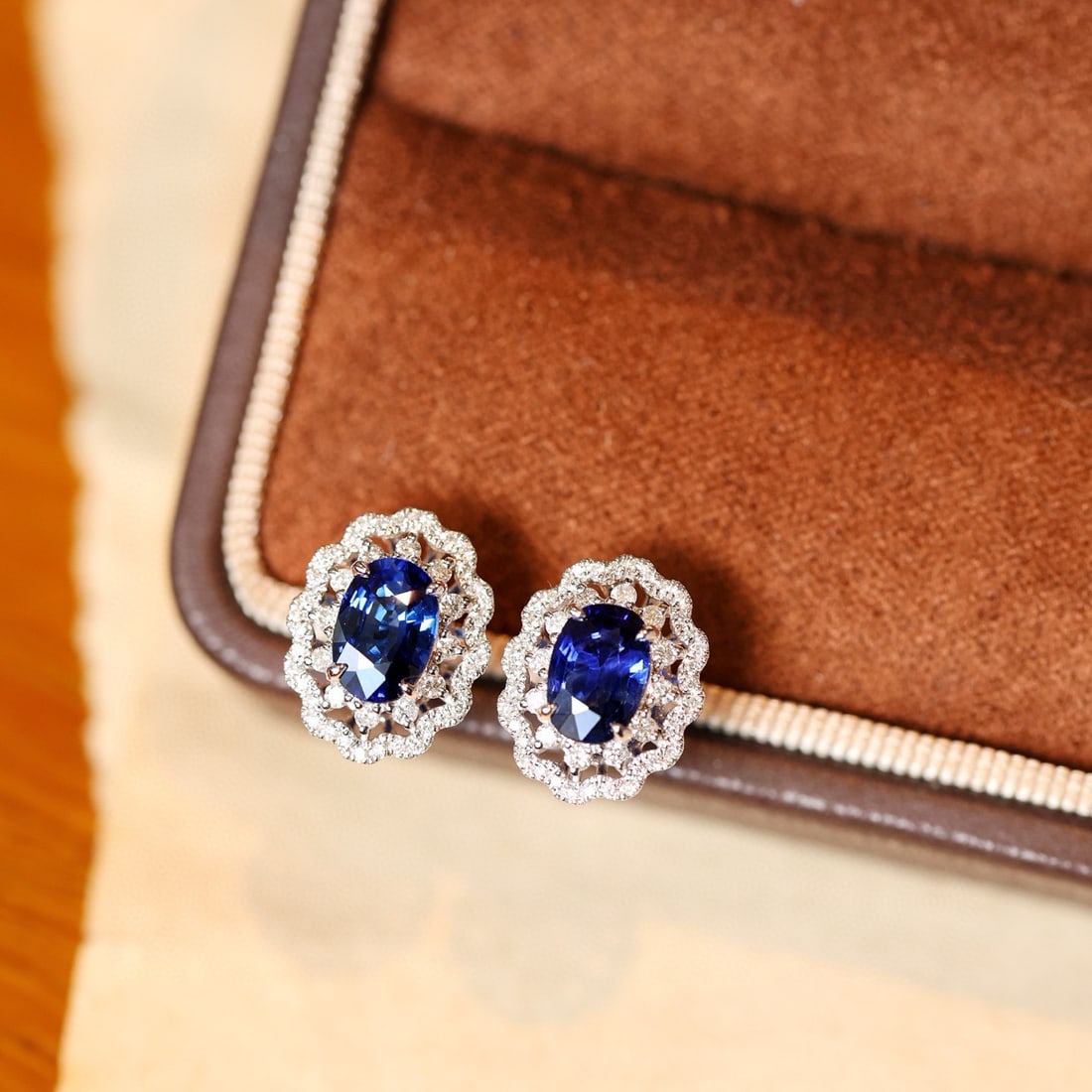 14K GOLD 2.49 CTW NATURAL SAPPHIRE & DIAMOND EARRINGS: Ref:231084105 // Gold Content:14K Gold // Main Gemstone:Sapphire // Shape:Oval // Carat Weight:2.03ct // Color:Blue // Treatment:Natural // // Adjacent Gemstone 2 : Diamond // Shape:Round // Carat Wei