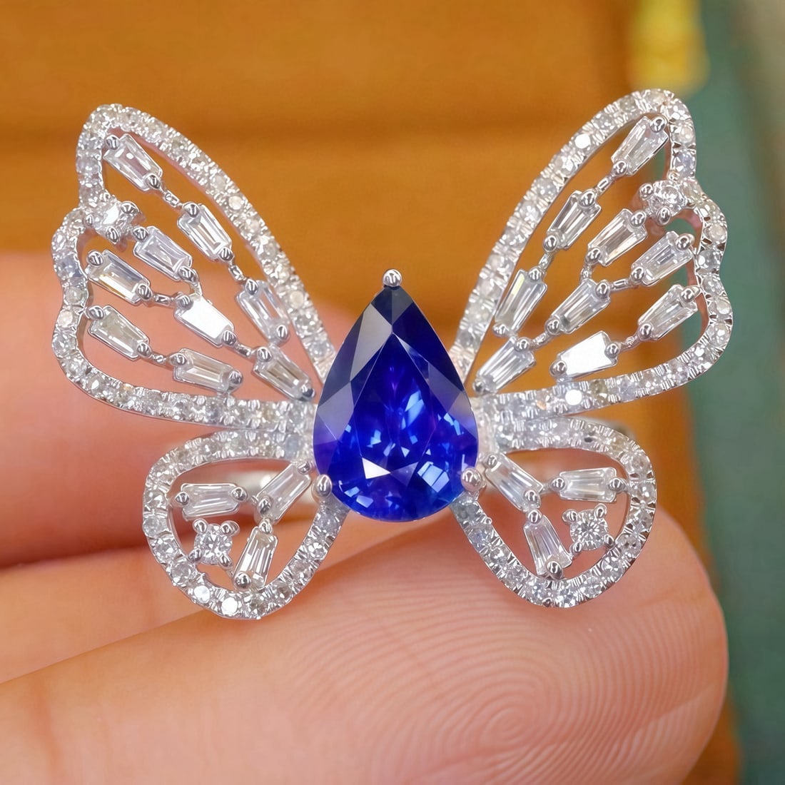 14K GOLD 1.80 CTW NATURAL SAPPHIRE & DIAMOND & BUTTERFLY RING: Ref:231084137 // Gold Content:14K Gold // Ring Size:7.25US // // Main Gemstone:Sapphire // Shape:Pear // Carat Weight:1.28ct // Color:Royal blue // Treatment:Natural // // Adjacent Gemstone 2 :