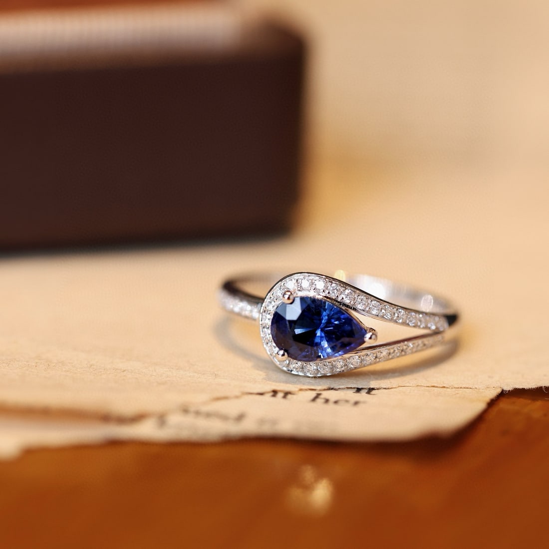 14K GOLD 1.30 CTW NATURAL SAPPHIRE & DIAMOND RING: Ref:231084147 // Gold Content:14K Gold // Ring Size:7.25US // // Main Gemstone:Sapphire // Shape:Pear // Carat Weight:1.11ct // Color:Royal blue // Treatment:Natural // // Adjacent Gemstone 2 :