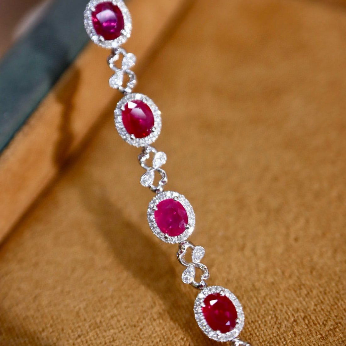 14K GOLD 5.85 CTW NATURAL RUBY & DIAMOND BRACELET: Ref:231084198 // Gold Content:14K Gold // Main Gemstone:Ruby // Shape:Oval // Carat Weight:5.25ct // Color:Red // Treatment:Natural // // Adjacent Gemstone 2 : Diamond // Shape:Round // Carat Weight:0