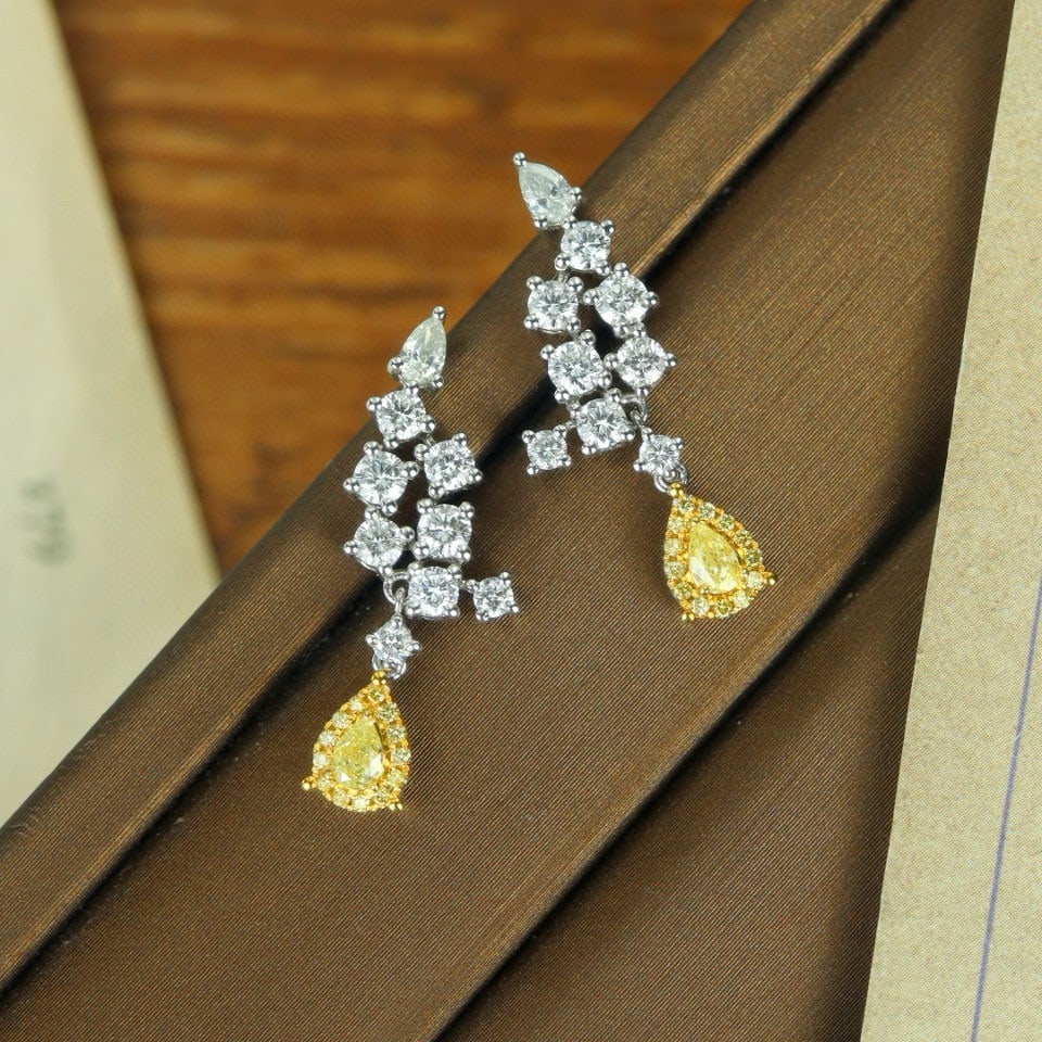 14K GOLD 1.42 CTW NATURAL YELLOW DIAMOND & DIAMOND EARRINGS: Ref:231084250 // Gold Content:14K Gold // Main Gemstone:Yellow Diamond // Shape:Pear // Carat Weight:0.22ct // Color:Yellow // Treatment:Natural // // Adjacent Gemstone 2 : Diamond //