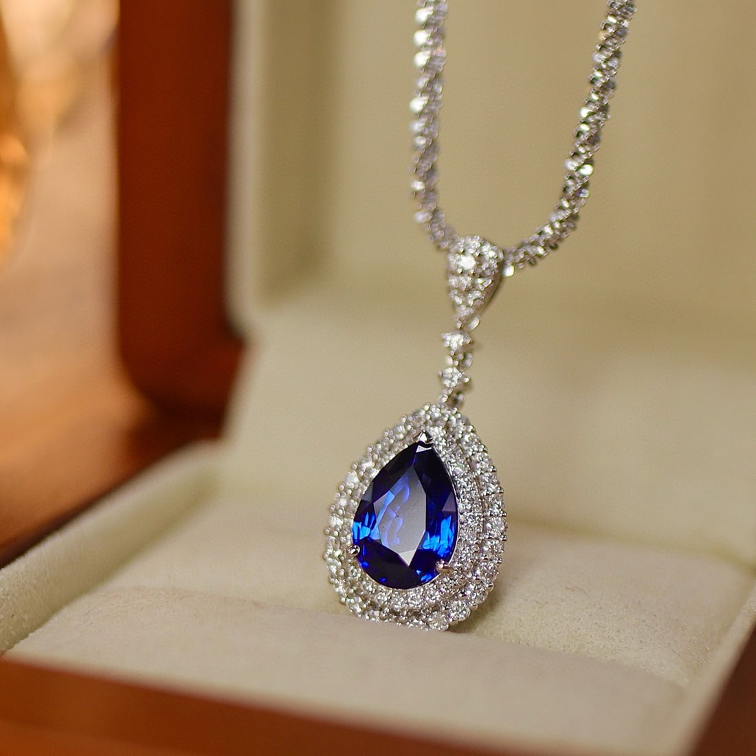 14K GOLD 2.07 CTW VIVID BLUE NATURAL SAPPHIRE & DIAMOND PENDANT( WITHOUT CHAIN ): Ref:231084413 // Gold Content:14K Gold // Main Gemstone:Sapphire // Shape:Pear // Carat Weight:1.59ct // Color:Vivid Blue // Treatment:Natural // // Adjacent Gemstone 2 : Diamond // Shape:Round //