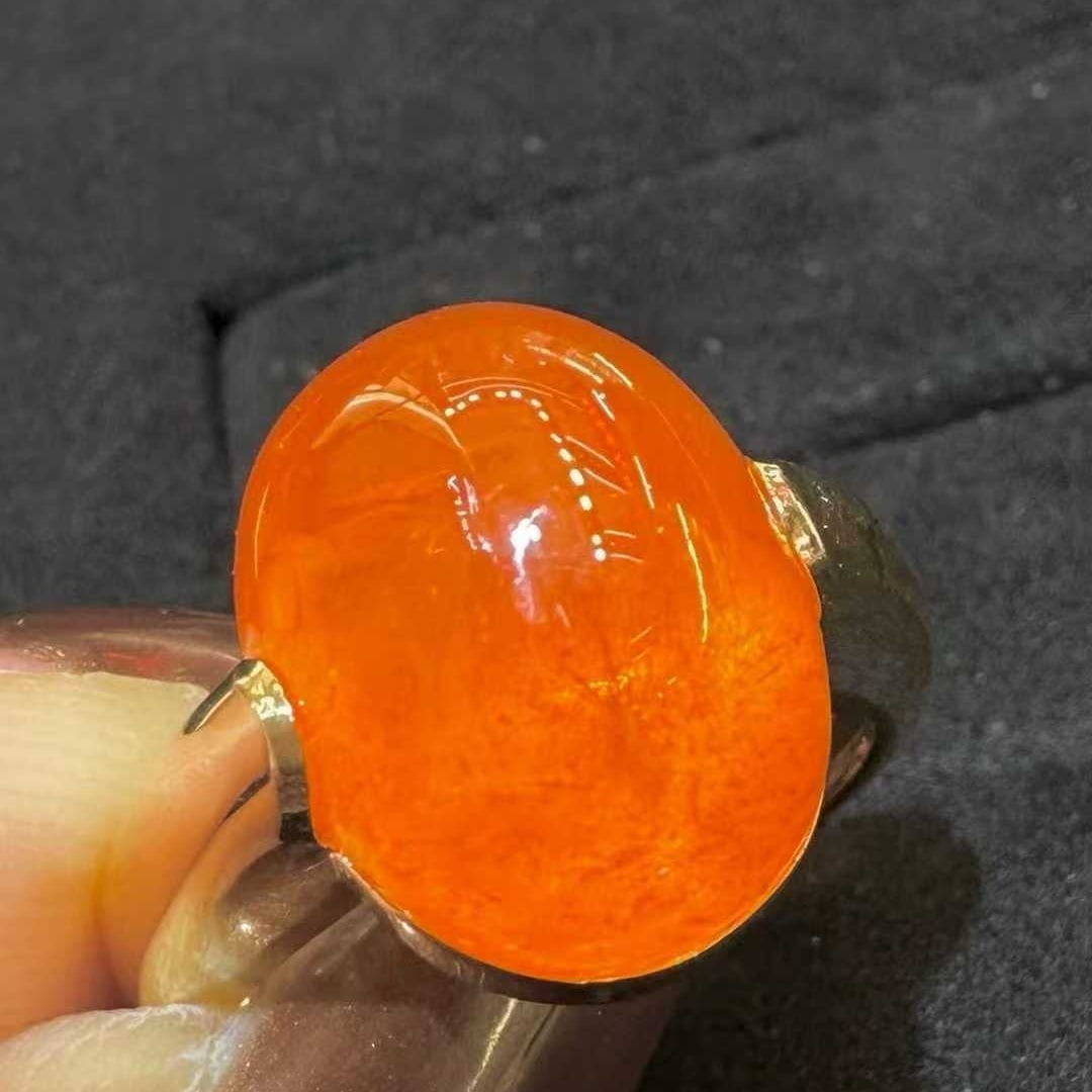 14k Gold 14.16 Ct Natural Spessartine Ring: Ref:231111049 // gold content:14k gold // ring size:7. 25us // // main gemstone:spessartine // shape:oval // carat weight:14. 16ct // color:orange // treatment:natural // Low Estimate: