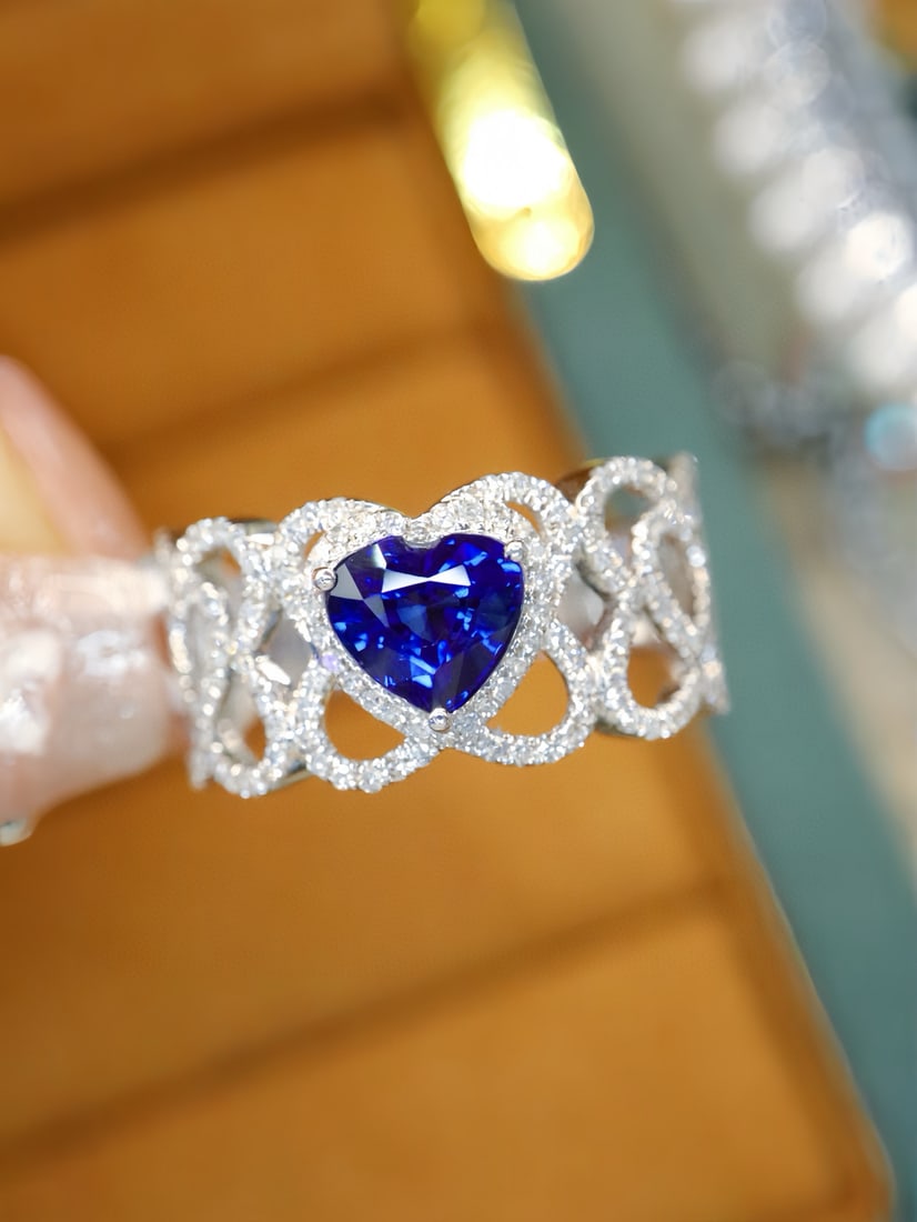 14k Gold 1.67 Ctw Vivid Blue Natural Sapphire & Diamond Ring: Ref:231111072 // gold content:14k gold // ring size:7. 25us // // main gemstone:sapphire // shape:heart // carat weight:1. 16ct // color:vivid blue // treatment:natural // // adjacent gemstone 2 :