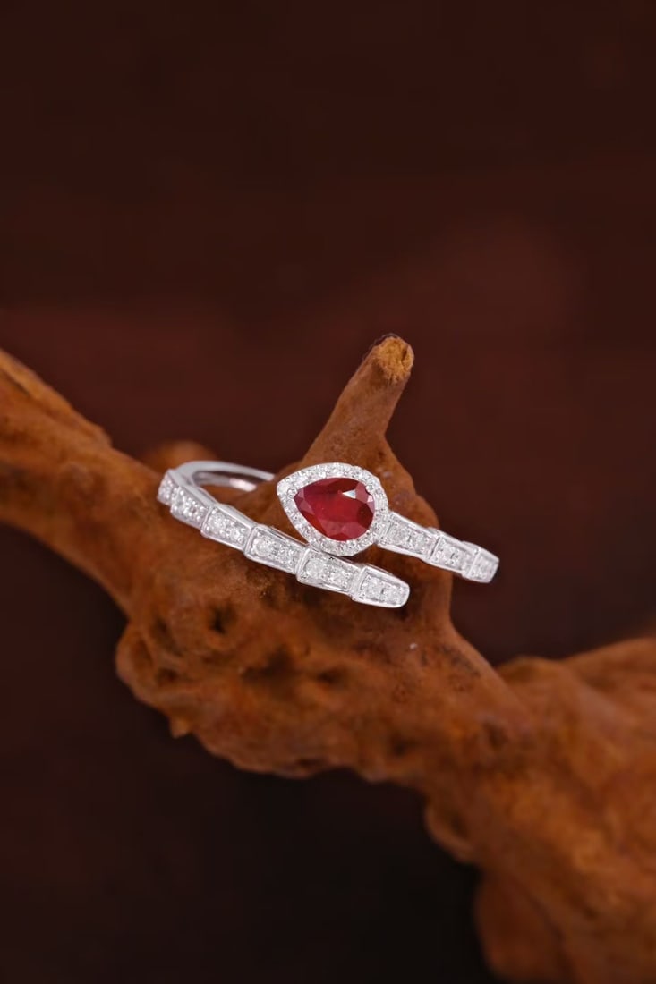 14k Gold 0.45 Ctw Natural Ruby & Diamond Ring: Ref:231111078 // gold content:14k gold // ring size:7. 25us // // main gemstone:ruby // shape:pear // carat weight:0. 28ct // color:red // treatment:natural // // adjacent gemstone 2 : diamond //