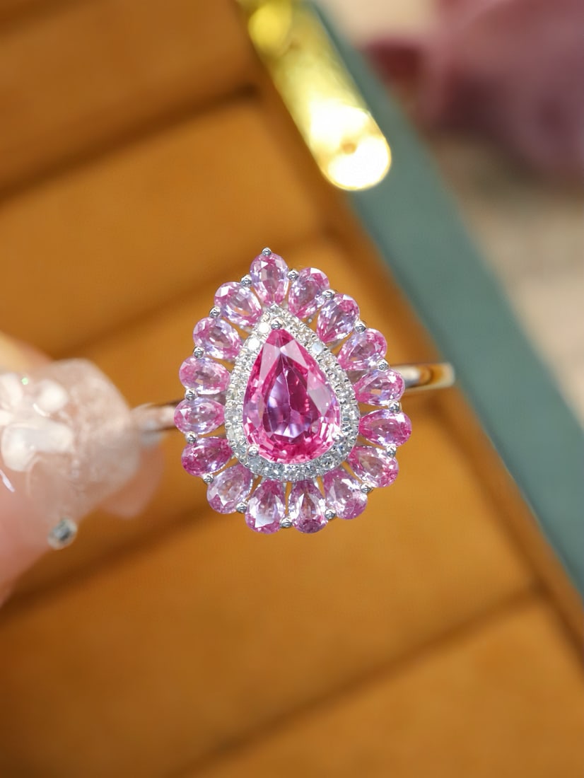 14k Gold 1.91 Ctw Natural Padparadscha Sapphire & Diamond Ring: Ref:231111111 // gold content:14k gold // ring size:7. 25us // // main gemstone:padparadscha sapphire // shape:pear // carat weight:1. 84ct // color:orangish pink // treatment:natural // //