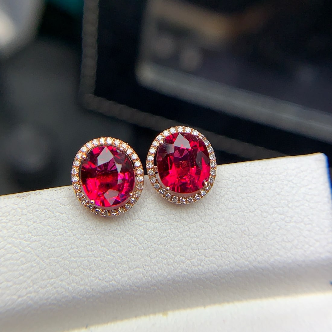 14k Gold 2.3 Ct Natural Tourmaline & Diamond Earrings: Ref:231111133 // gold content:14k gold // main gemstone:tourmaline // shape:oval // carat weight:2. 3ct // color:red // treatment:natural // // adjacent gemstone 2 : diamond // shape:round // clarity