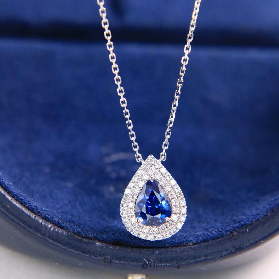 14k Gold 1.12 Ctw Vivid Blue Natural Sapphire & Diamond Necklace: Ref:231112124 // gold content:14k gold // main gemstone:sapphire // shape:pear // carat weight:0. 98ct // color:vivid blue // treatment:natural // // adjacent gemstone 2 : diamond // shape:round //
