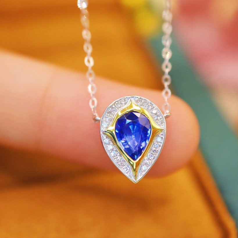 14k Gold 0.95 Ctw Natural Sapphire & Diamond Necklace: Ref:231112194 // gold content:14k gold // main gemstone:sapphire // shape:pear // carat weight:0. 88ct // color:blue // treatment:natural // // adjacent gemstone 2 : diamond // number of stones:24 //