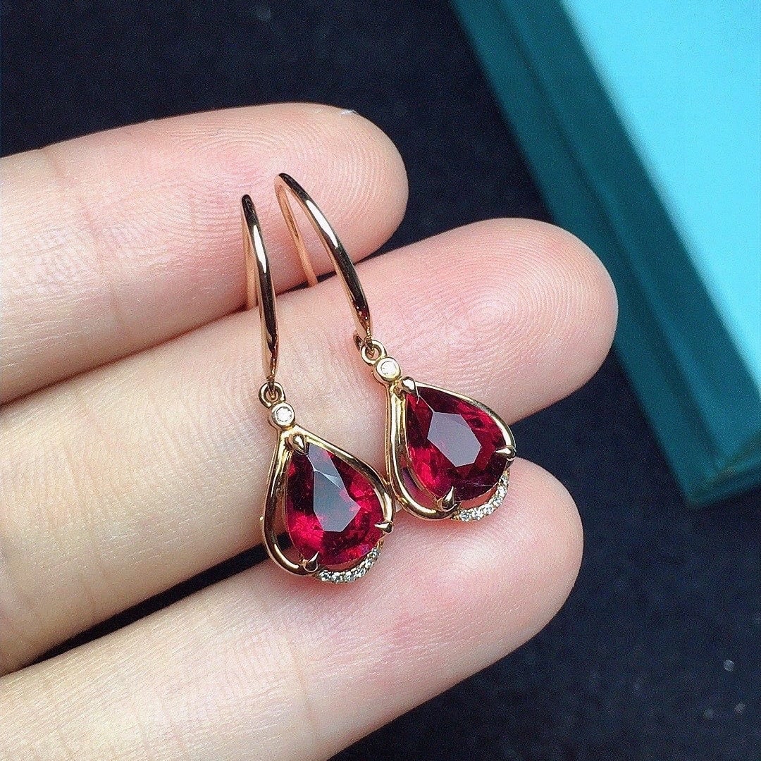 14k Gold 2.26 Ct Natural Tourmaline & Diamond Earrings: Ref:231112227 // gold content:14k gold // main gemstone:tourmaline // shape:pear // carat weight:2. 26ct // color:red // treatment:natural // // adjacent gemstone 2 : diamond // number of stones:14
