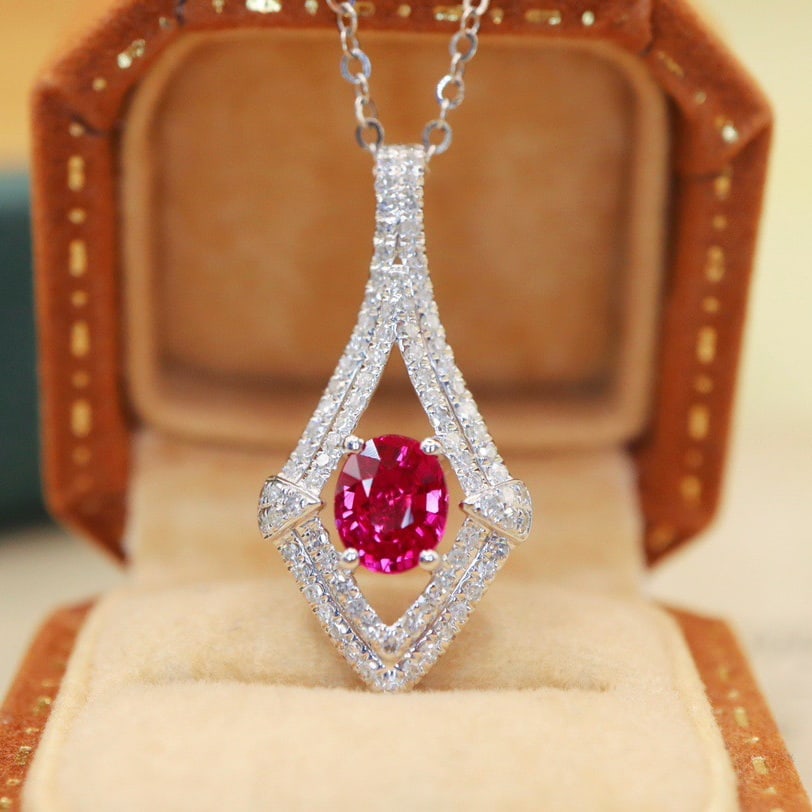 14k Gold 0.91 Ctw Natural Ruby & Diamond Pendant( Without Chain ): Ref:231112283 // gold content:14k gold // main gemstone:ruby // shape:oval // carat weight:0. 65ct // color:red // treatment:natural // // adjacent gemstone 2 : diamond // number of stones:87 //