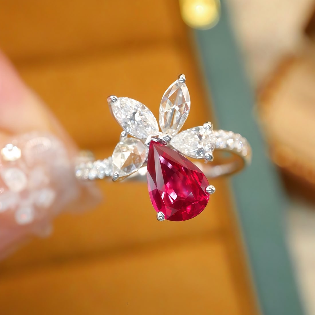 14k Gold 1.63 Ctw Natural Ruby & Diamond Ring: Ref:231112417 // gold content:14k gold // ring size:7. 25us // // main gemstone:ruby // shape:pear // carat weight:1. 02ct // color:red // treatment:natural // // adjacent gemstone 2 : diamond //