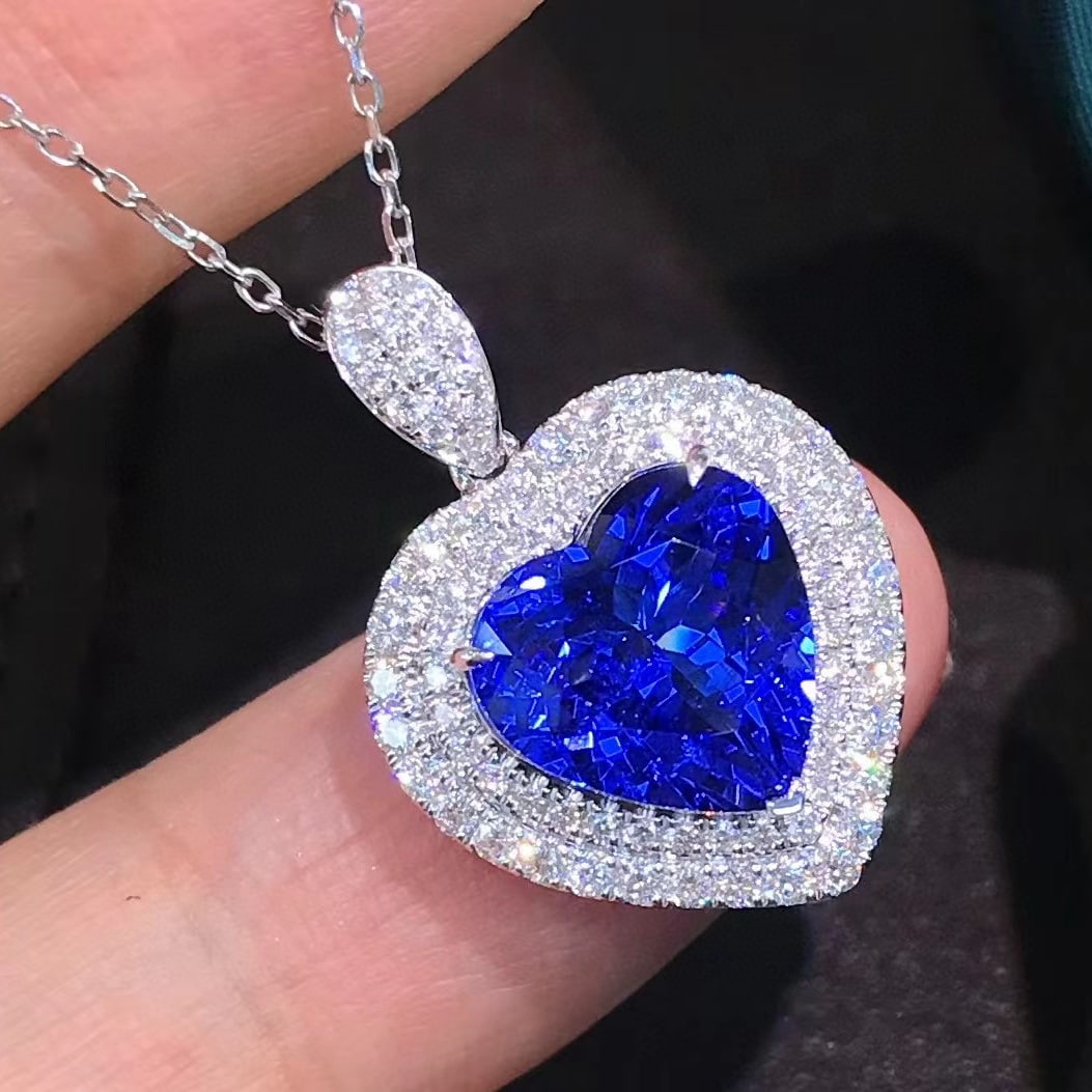 14k Gold 4.57 Ctw Natural Tanzanite & Diamond Pendant( Without Chain ): Ref:231085046 // gold content:14k gold // main gemstone:tanzanite // shape:heart // carat weight:4. 02ct // color:blue // treatment:natural // // adjacent gemstone 2 : diamond // shape:round //