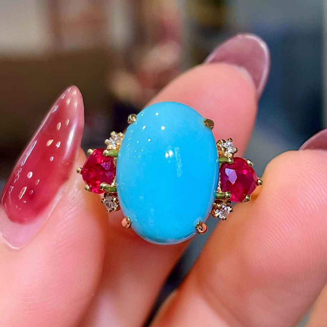 14k Gold 7.85 Ctw Natural Blue Turquoise & Ruby Ring: Ref:231085056 // gold content:14k gold // ring size:7. 25us // // main gemstone:blue turquoise // shape:oval // carat weight:6. 83ct // color:blue // treatment:natural // // adjacent gemstone 2 :