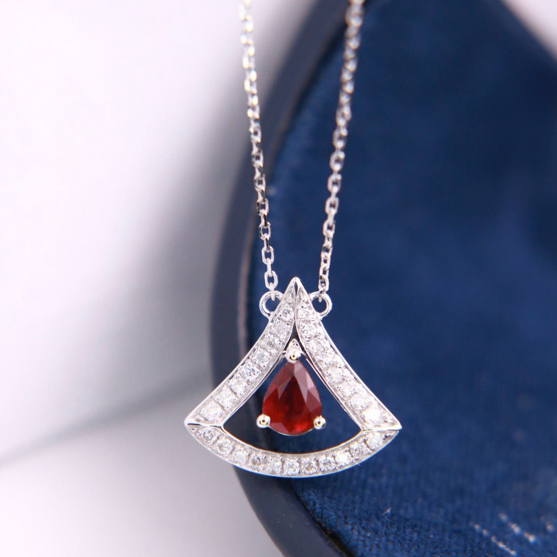 14k Gold 0.49 Ctw Vivid Red Natural Ruby & Diamond Necklace: Ref:231085065 // gold content:14k gold // main gemstone:ruby // shape:pear // carat weight:0. 35ct // color:vivid red // treatment:natural // // adjacent gemstone 2 : diamond // shape:round //