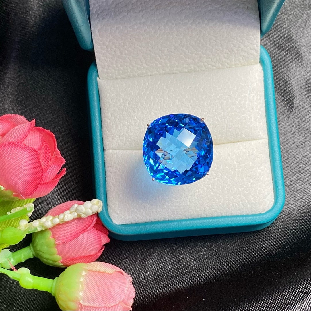 14k Gold 32 Ct Natural Topaz & Diamond Ring: Ref:231085121 // gold content:14k gold // ring size:7. 25us // // main gemstone:topaz // shape:cushion // carat weight:32ct // color:blue // treatment:natural // // adjacent gemstone 2 : diamond // nu