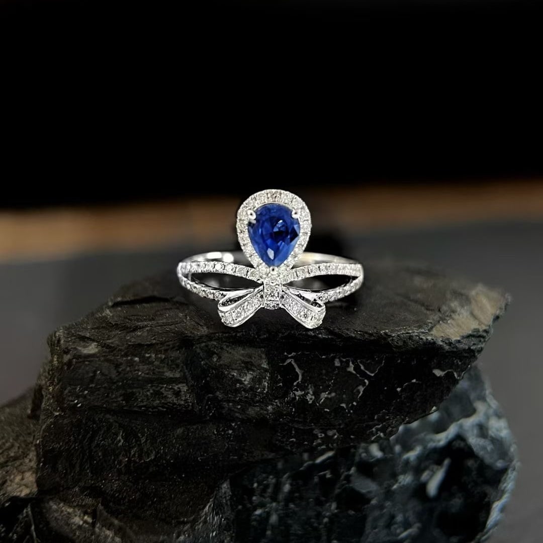 14k Gold 1.20 Ctw Natural Sapphire & Diamond Ring: Ref:231085250 // gold content:14k gold // ring size:7. 25us // // main gemstone:sapphire // shape:pear // carat weight:0. 85ct // color:blue // treatment:natural // // adjacent gemstone 2 :