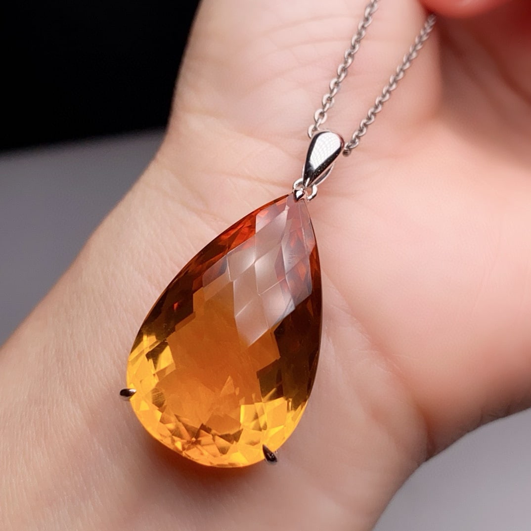 14k Gold 31.14 Ct Natural Citrine Pendant( Without Chain ): Ref:231086166 // gold content:14k gold // main gemstone:citrine // shape:pear // carat weight:31. 14ct // color:yellow // treatment:natural // Condition: NewLow Estimate: 6400.00High Estimate:
