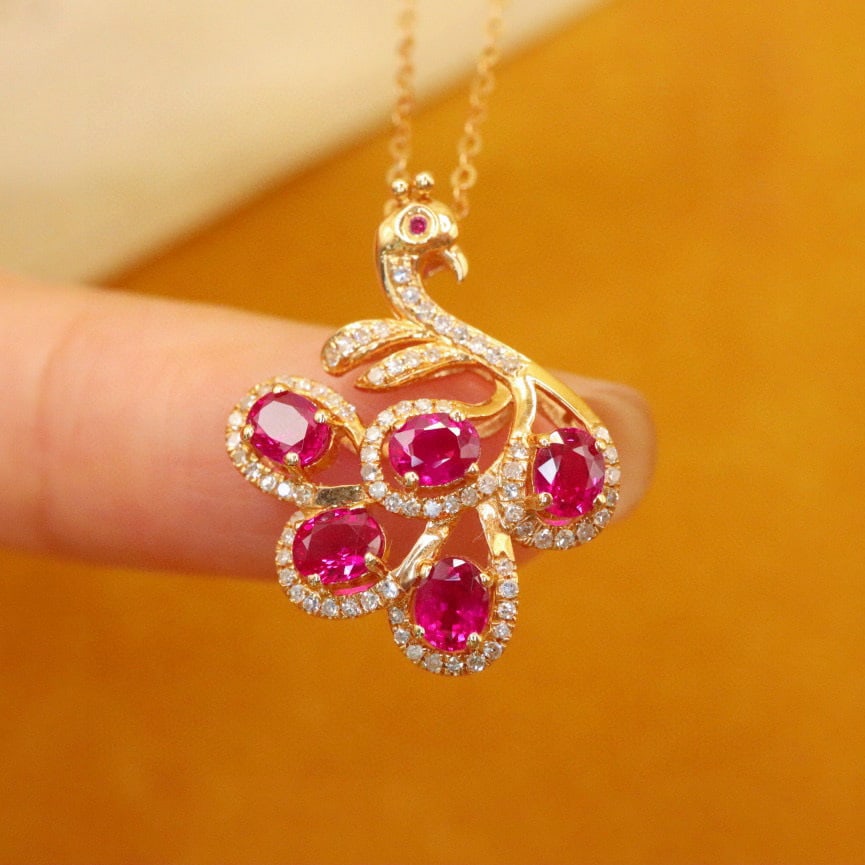 14k Gold 1.51 Ctw Natural Ruby & Diamond Pendant( Without Chain ): Ref:231086176 // gold content:14k gold // main gemstone:ruby // shape:oval // carat weight:1. 28ct // color:red // treatment:natural // // adjacent gemstone 2 : diamond // number of stones:78 //