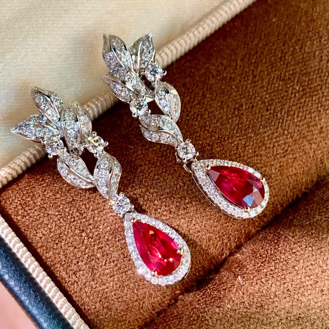 14k Gold 2.09 Ctw Natural Ruby & Diamond Earrings: Ref:231086200 // gold content:14k gold // main gemstone:ruby // shape:pear // carat weight:1. 40ct // color:pigeonblood red // treatment:natural // // adjacent gemstone 2 : diamond // shape:round // c