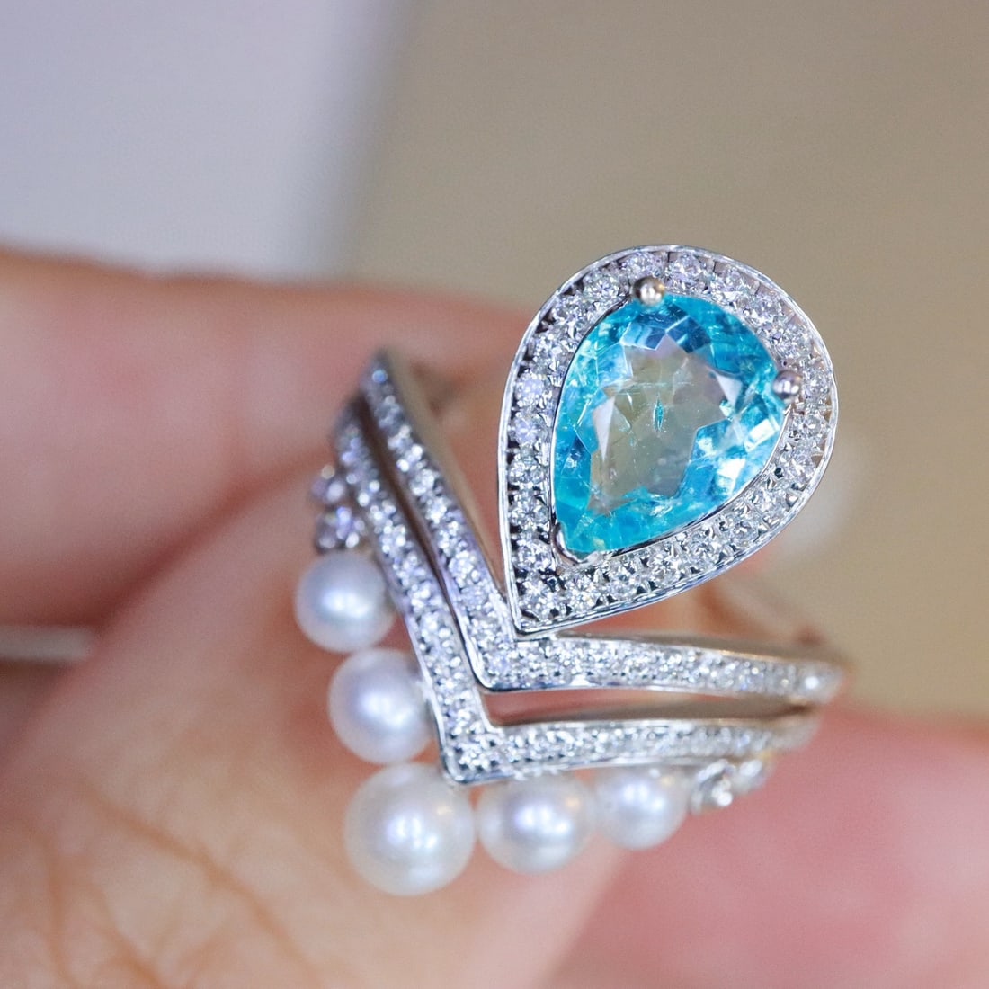 14k Gold 1.22 Ctw Natural Paraiba Tourmaline & Diamond Ring: Ref:231086215 // gold content:14k gold // ring size:7. 25us // // main gemstone:paraiba tourmaline // shape:pear // carat weight:0. 91ct // color:blue // treatment:natural // // adjacent gemstone 2 :