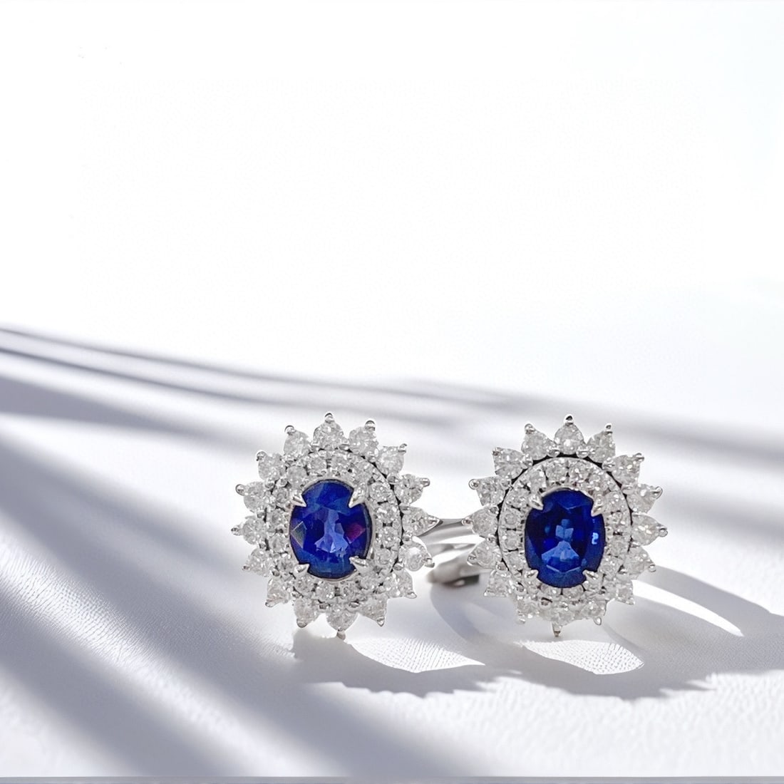 14k Gold 1.60 Ctw Natural Sapphire & Diamond Earrings: Ref:231086277 // gold content:14k gold // main gemstone:sapphire // shape:oval // carat weight:0. 96ct // color:blue // treatment:natural // // adjacent gemstone 2 : diamond // shape:round // carat