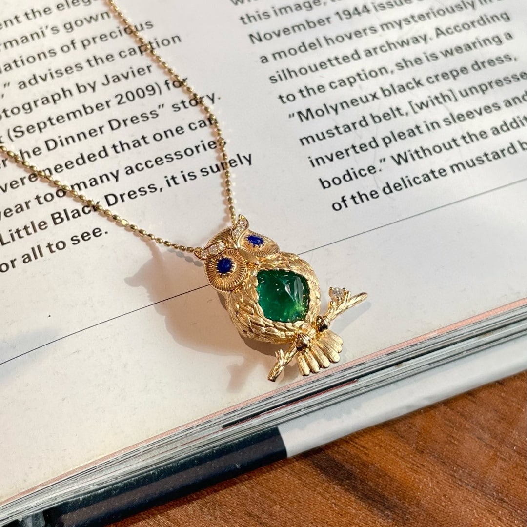 14k Gold 3.12 Ct Vivid Green Natural Emerald & Diamond & Sapphire Pendant( Without Chain ): Ref:231086369 // gold content:14k gold // main gemstone:emerald // shape:sugar-loaf // carat weight:3. 12ct // color:vivid green // treatment:natural // // adjacent gemstone 2 : diamond //