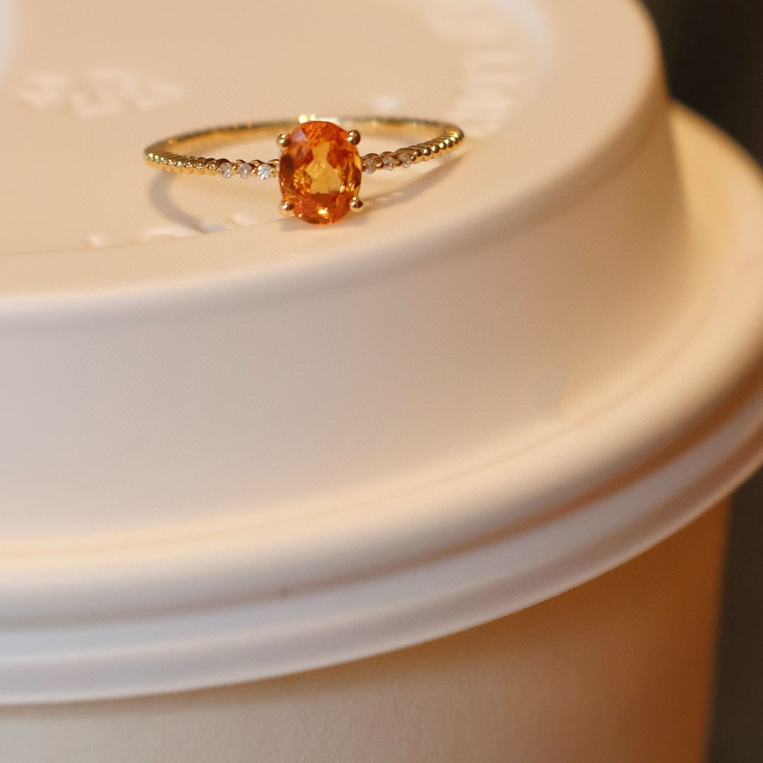 14k Gold 0.7 Ct Natural Spessartine & Diamond Ring: Ref:231086380 // gold content:14k gold // ring size:7. 25us // // main gemstone:spessartine // shape:oval // carat weight:0. 7ct // color:orange // treatment:natural // // adjacent gemstone 2 :