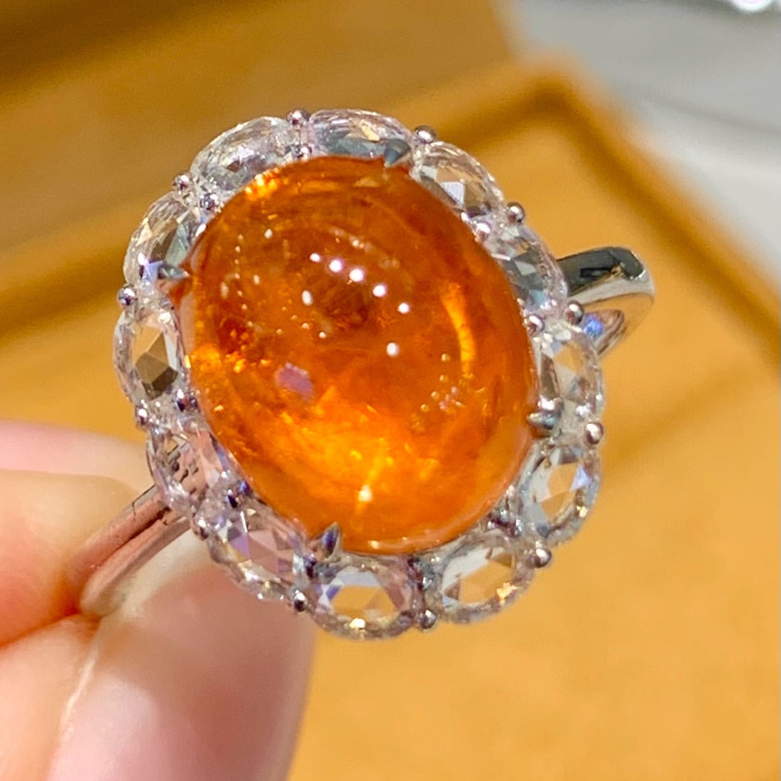14k Gold 5.2 Ct Natural Spessartine & Sapphire Ring: Ref:231086428 // gold content:14k gold // ring size:7. 25us // // main gemstone:spessartine // shape:oval // carat weight:5. 2ct // color:orange // treatment:natural // // adjacent gemstone 2 :