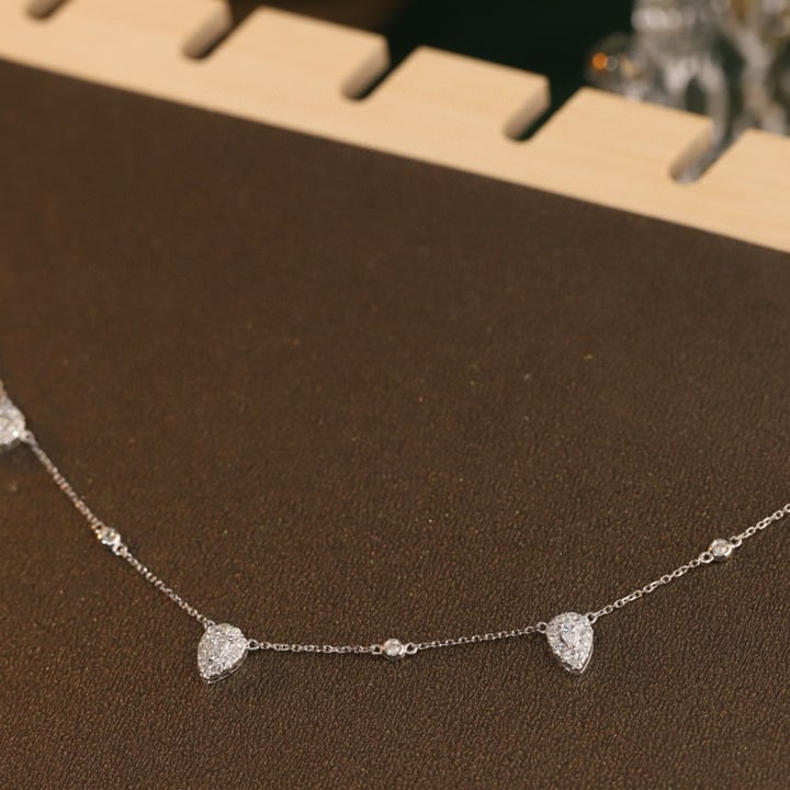 14k Gold 0.90 Ct Natural H Diamond Necklace: Ref:231087147 // gold content:14k gold // main gemstone:diamond // shape:multiple // carat weight:0. 90ct // clarity grade:vs-si // color:h // treatment:natural // Condition: NewLow Estimate: