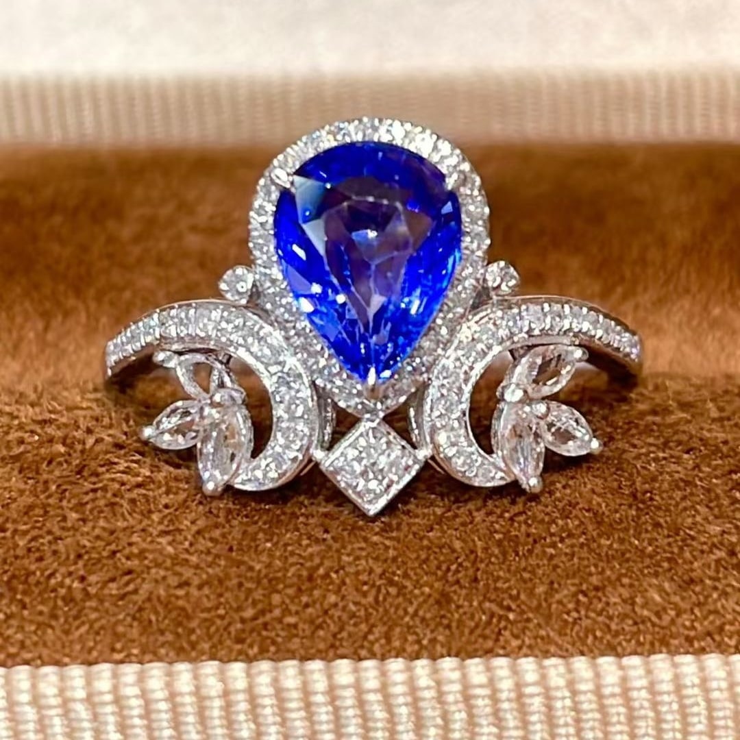 14k Gold 1.57 Ct Natural Sapphire & Diamond Ring: Ref:231087153 // gold content:14k gold // ring size:7. 25 us // // main gemstone:sapphire // shape:pear // carat weight:1. 57ct // color:blue // treatment:natural // // adjacent gemstone 2 : diamond /