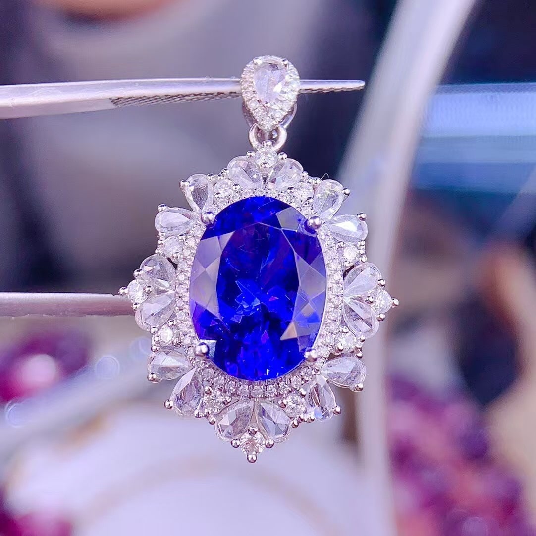 14k Gold 5 Ct Natural Tanzanite & Diamond Pendant( Without Chain ): Ref:231087203 // gold content:14k gold // main gemstone:tanzanite // shape:oval // carat weight:5ct // color:blue // treatment:natural // // adjacent gemstone 2 : diamond // shape:round // clarity